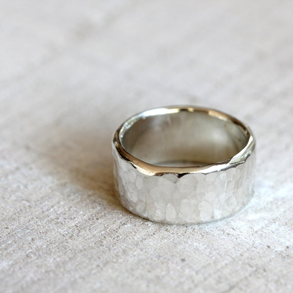 Men's wide band hammered sterling silver ring